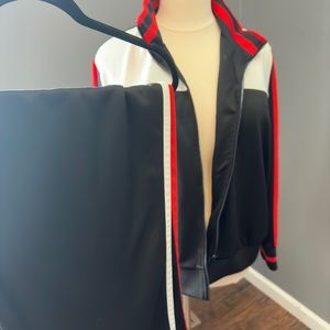 NWOT. 2piece track Includes jacket and pants by Wild Fable